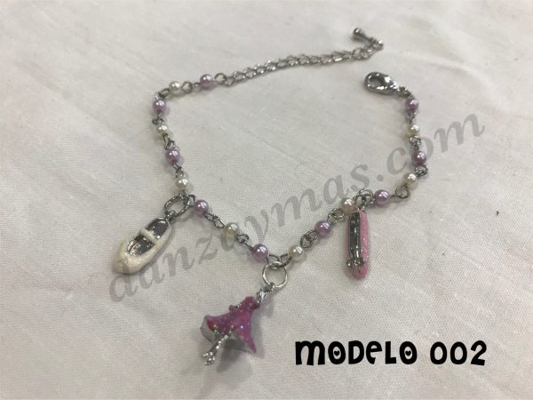 Pulsera de ballet con figuras y perlas