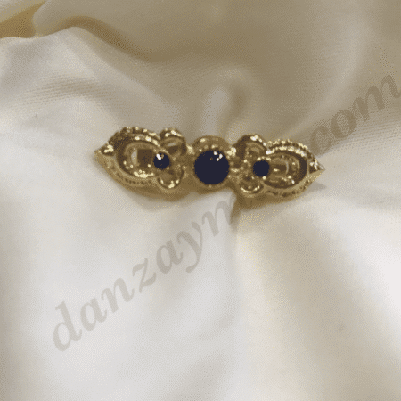 Broche para traje regional de niña.