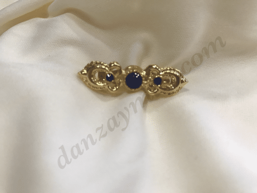 Broche para traje regional de niña.