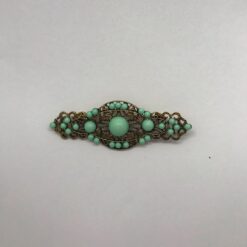 Broche para flamenca con medias perlas de colores variados fabricado en oro viejo