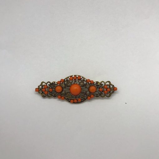 Broche para flamenca con medias perlas de colores variados fabricado en oro viejo