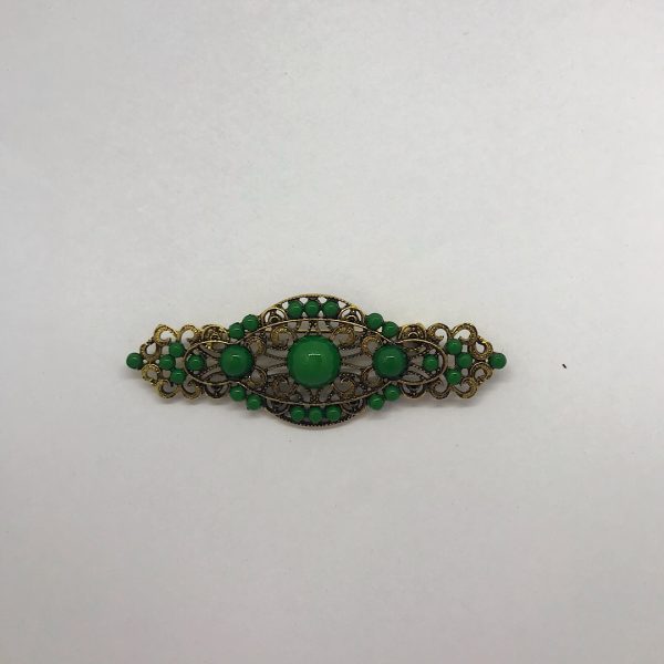 Broche para flamenca con medias perlas de colores variados fabricado en oro viejo