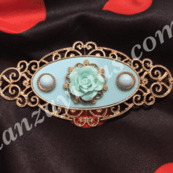 Broche flamenco con rosa en relieve y dorado para conjuntar con tus trajes de flamenca