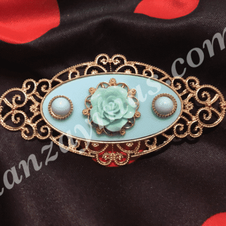 Broche flamenco con rosa en relieve y dorado para conjuntar con tus trajes de flamenca