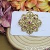 Broche redondo dorado
