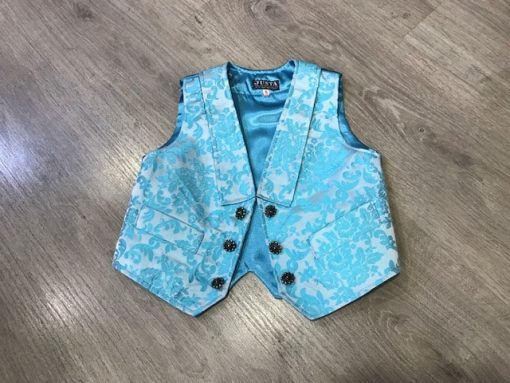 Chaleco huertano celeste y plata confeccionado en tejido brocado con solapa y bolsillos.