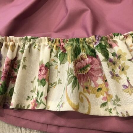 Zagalejo flores para niña con volante de flores variadas en color y falda rosa
