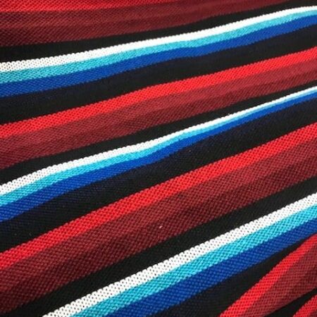 Refajo listas para niña en tonos rojos,azules,blancos y negros con el que podrás combinar cualquier color de delantal de huertana