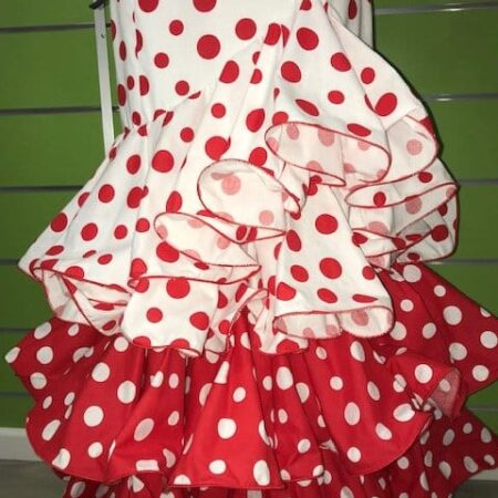 Falda flamenca roja con lunares encontrados grandes y llamativos con cintura alta