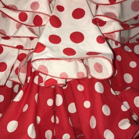 Falda flamenca roja con lunares encontrados grandes y llamativos con cintura alta
