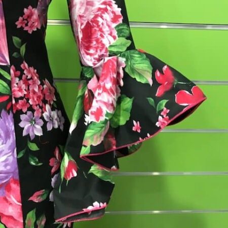 Vestido flamenco flores con falda canastera talla 40 con fondo negro y flores en malva, rosa y fucsia