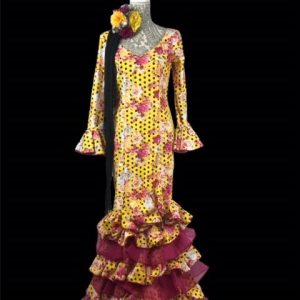 <a href="https://danzaymas.com/tienda/flamenco-espanol/ropa-flamenco/trajes-de-flamenca/traje-flamenca-senora/traje-de-flamenca-amarillo-lunar-talla-40-1490/">Traje de flamenca amarillo lunar</a>