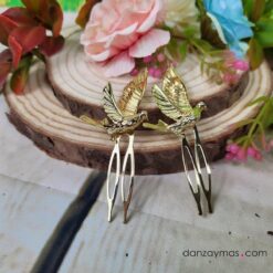 Peinecillos con pájaros dorados