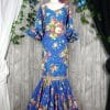 Traje de flamenca azul con flores