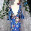 Traje de flamenca azul con flores