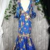 Traje de flamenca azul con flores