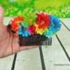 Peineta con flores tipo margaritas