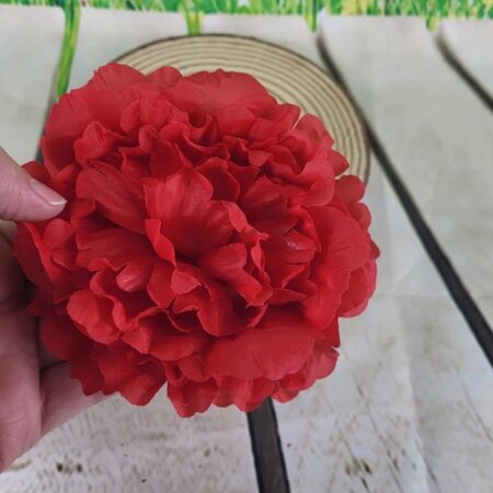 Flor peonia con pinza