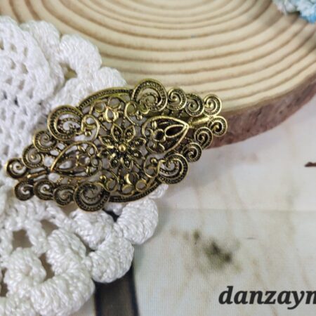 Broche para flamenca en oro viejo
