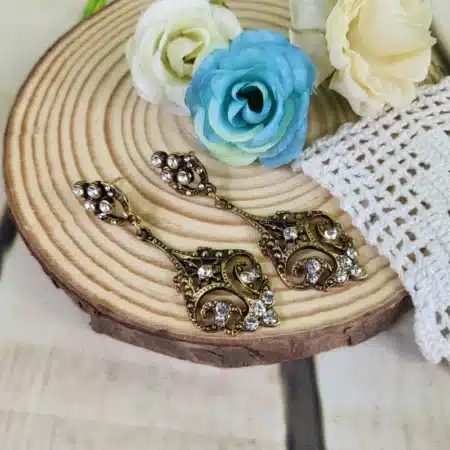 Pendientes calados cristal dorado con brillantes