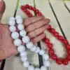 Collar de bolas para flamenca rojo y blanco con cierre de argolla.