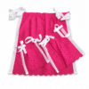 Delantal regional fucsia de batista perforada con puntilla blanca